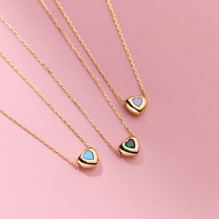 Heart Necklace Set of 5 - 925 Silver Wholesale for Business Gifts - A set of three 925 sterling silver heart pendant necklaces with assorted colored gemstones, available for wholesale from JR Fashion Accessories.