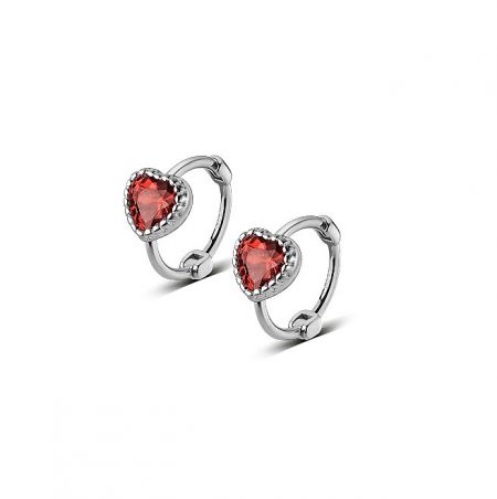 Detailed shot of the 925 sterling silver hoop earring featuring a vibrant red cubic zirconia stone.