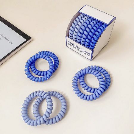 Blue telephone cord hair ties with strong elasticity.