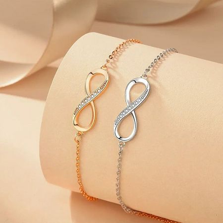 The infinity bracelet available in both stunning silver and warm gold tones.