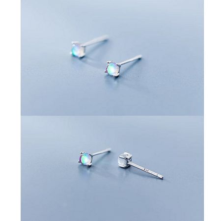 A macro shot of the iridescent moonstone, highlighting its color play.