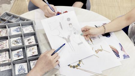 The JR Fashion Accessories design team collaborating on new jewelry sketches and prototypes.