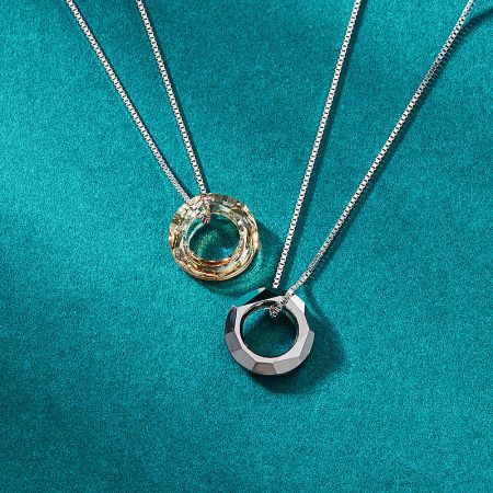 Crystal Circle Ring Pendant 925 Sterling Silver Box Chain Necklaces (Set of 5) - A promotional shot of two crystal circle ring pendant necklaces, part of a set of five, made from 925 sterling silver with a box chain.