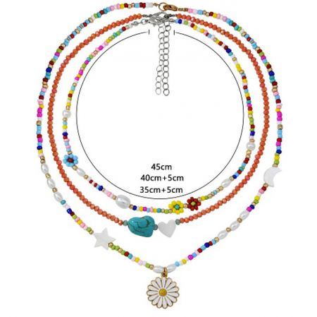 Detailed view of the layered beaded necklace showing the adjustable lobster clasp.