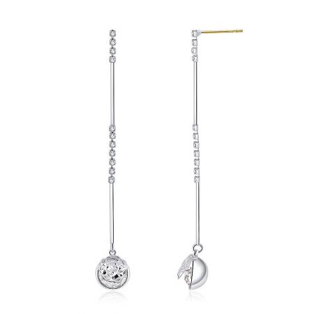 Side view of the elegant long silver earrings showcasing the clear stone embellishments and distinctive pendants.