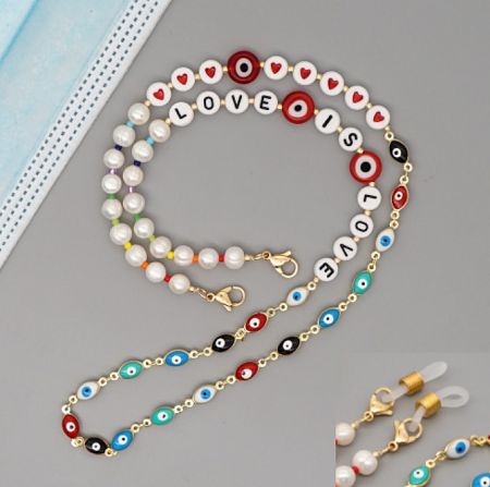 Example of a custom beaded mask chain design with 'LOVE IS LOVE' lettering, showcasing customization options.