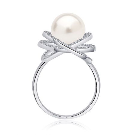 Close-up detail of the luxurious silver pearl ring, highlighting the lustrous pearl and sparkling diamond-like accents.