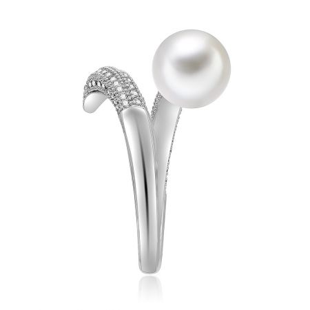 A close-up lifestyle shot highlighting the luxurious appeal of the pearl and cubic zirconia ring.