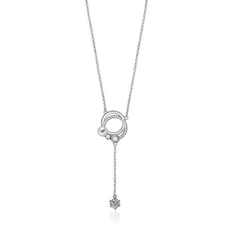 Double Ring Drop CZ Pendant - A close-up of the Double Ring Drop CZ Pendant, showcasing its interlocking rings paved with cubic zirconia and a central white pearl.