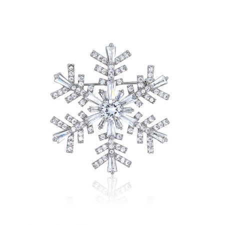 Snowflake Brooch with AAA Cubic Zirconia - A luxurious snowflake-shaped brooch made of rhodium-plated brass, adorned with sparkling AAA-grade cubic zirconia crystals, shown against a white background.