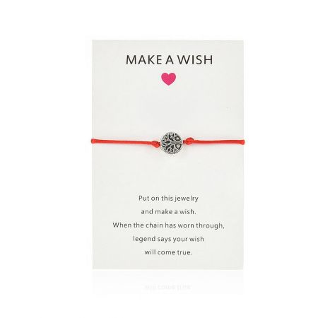 The complete Tree of Life wish bracelet package, including the card with its meaningful message.