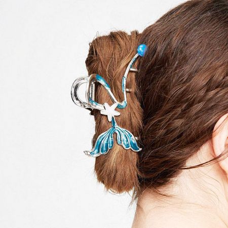 A clear product shot of the mermaid-themed hair clip on a white background.