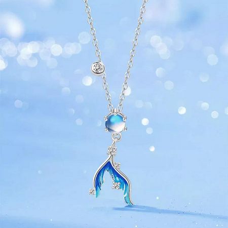 925 Sterling Silver Moonstone Mermaid Tail Necklace Set - A stunning 925 sterling silver necklace featuring a mermaid tail pendant with a shimmering moonstone and clear gemstone accents.