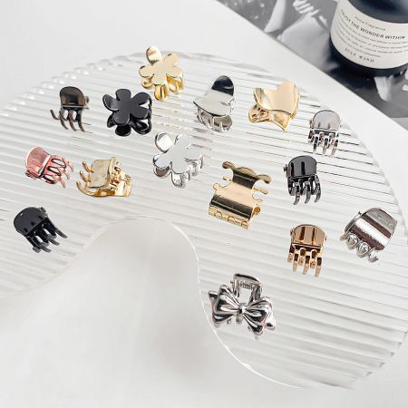 10pcs/pack Mini Metal Alloy Small Hair Claw Clips (5 sets) - A diverse collection of mini metal alloy hair claw clips in various shapes like flowers and bows, and colors including gold, silver, and black.