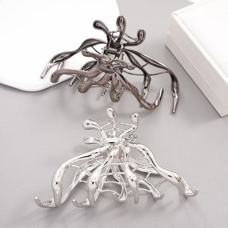 Halloween Zinc Alloy Hair Clips with Silver & Black Spider Web Design (5 pcs) - Two metal claw hair clips, including one with a silver and black Halloween spider web design.