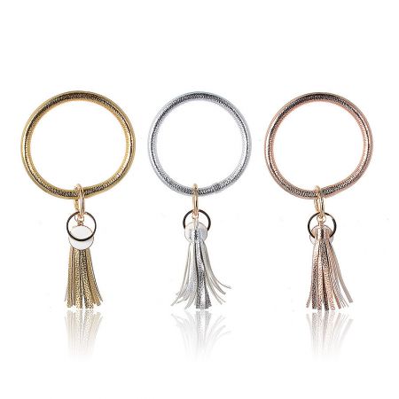 Stylish metallic tassel keychains in gold, silver, and rose gold finishes.