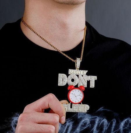 Custom Money Don't Sleep Hip Hop Necklace - Custom 'Money Don't Sleep' hip hop necklace pendant featuring an alarm clock design, crafted in gold-plated metal with sparkling stones.