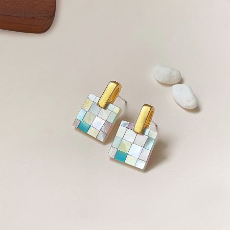 A pair of colorful mosaic stud earrings with a secure gold clasp, showing the intricate tile design.