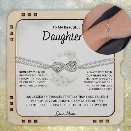 A sentimental gift set showing the bracelet and a message of love from mother to daughter.