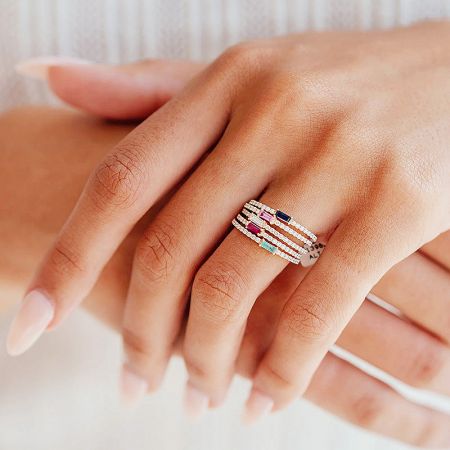 Detailed product shot of the multi-colored baguette zircon crystal ring set.