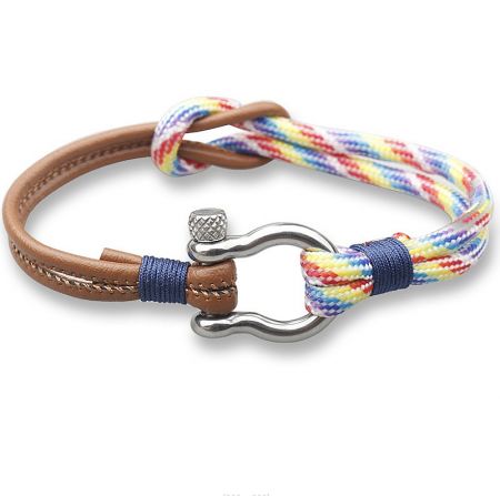Detailed view of the multicolored woven cord and leather strap on the men's rope bracelet.