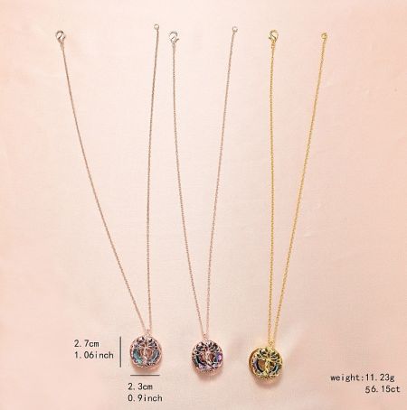 Detailed view of three Tree of Life necklace pendants showing different sizes and material options.