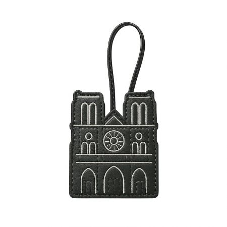 Elegant leather keychain featuring the Notre-Dame Cathedral.