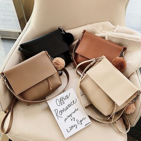 Collection of the large capacity cross body bags available in multiple colors for wholesale.