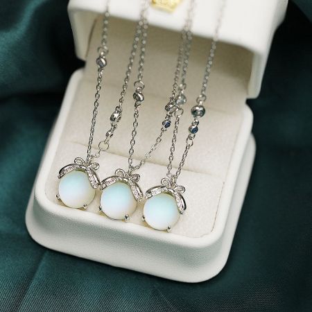 The complete set of five firefly stone necklaces in a gift box.