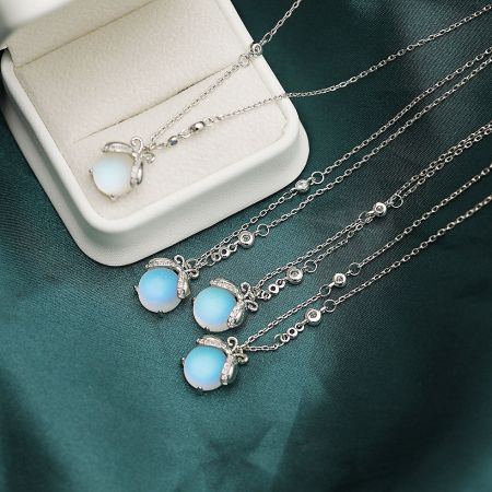 Various styles of the brass and resin stone necklaces.