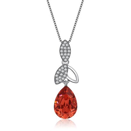 Detailed view of the pear-shaped red Swarovski crystal pendant with intricate silver detailing.