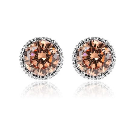 Solitaire Stud Crown Earrings in Rhodium Wholesale - A pair of Solitaire Stud Crown Earrings in rhodium plating, featuring peach-colored, faceted cubic zirconia gemstones in a detailed silver crown setting.