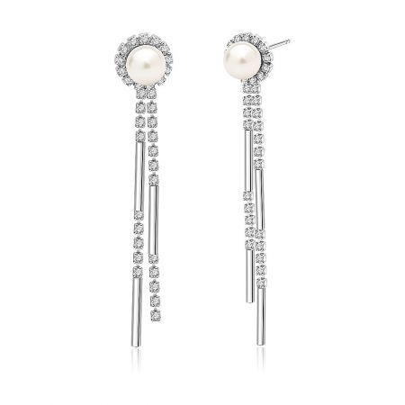 Detailed shot of the pearl and cubic zirconia drop earrings on a silver base, showing the intricate craftsmanship.