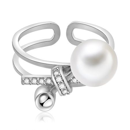 Bow Tie Ring With Pearl - Close-up of the Bow Tie Ring with Pearl, showcasing the central 8mm glass pearl and surrounding white cubic zirconia on a rhodium-plated band.