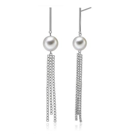 Close-up of the Cast Line tassel earrings, showing the intricate pearl and cubic zirconia details.