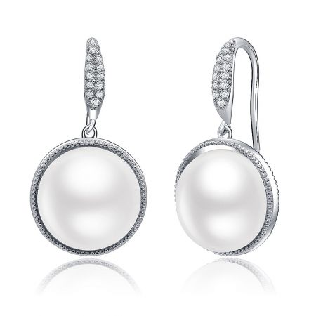 Detailed shot of the imitation pearl earrings, displaying the intricate craftsmanship and sparkle of the CZ stones.