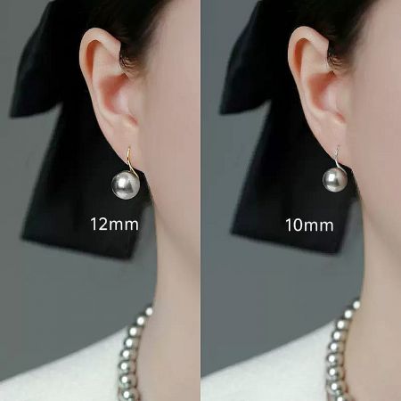 A model wearing the 10mm and 12mm pearl earrings to show how they look when worn.