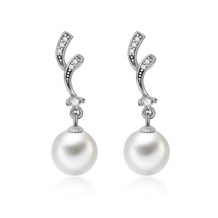 Silver Shell Pearl Earring - A pair of Silver Shell Pearl Earrings featuring large white pearls with oxidized 925 sterling silver hooks and sparkling cubic zirconia accents.
