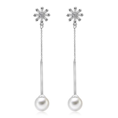 CZ Simulated Pearl Dangle Earrings - A close-up view of the CZ Simulated Pearl Dangle Earrings, showcasing the intricate silver and crystal details above the lustrous pearl.