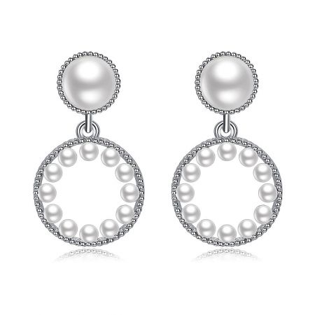Pearly Baby Earrings - Close-up of Pearly Baby Earrings, showcasing the rhodium-plated brass setting with white cubic zirconia and elegant plastic pearls.