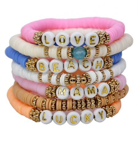 Various styles of personalized beaded bracelets displayed together.