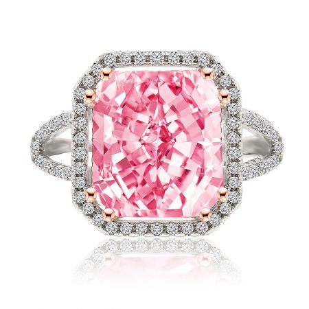Will You Be Mine Ring - A stunning close-up of the 'Will You Be Mine' ring, featuring a large pink cubic zirconia centerpiece surrounded by a halo of smaller white stones on a two-tone rhodium and rose gold plated band.