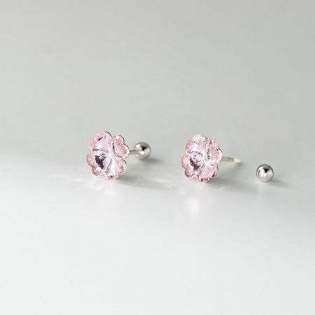 A pair of delicate pink crystal four-leaf clover stud earrings in 925 sterling silver.