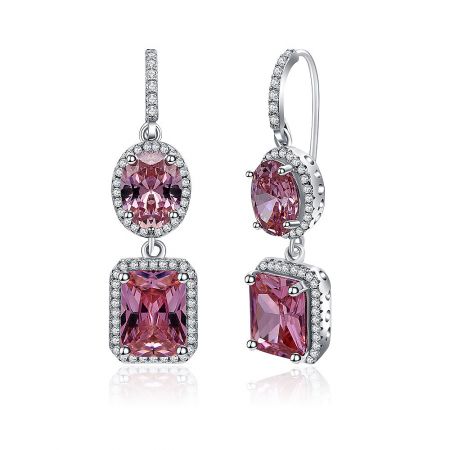 Close-up view of the pink gemstone and white diamond details on the silver-plated drop earrings.