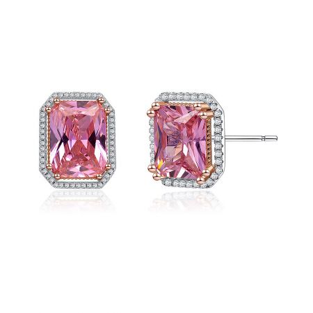Detailed shot of the pink gemstone earrings, emphasizing the faceted cuts of the central stone and its brilliant sparkle.