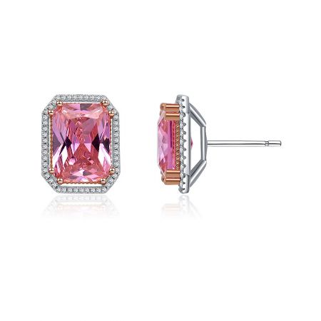 Side view of the cushion cut pink earrings, highlighting the diamond halo and the two-tone rose gold and silver setting.