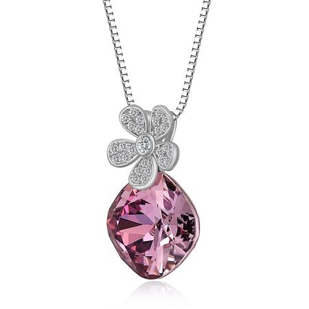 Side angle of the Lovely Flower Necklace pendant, showing its intricate sterling silver craftsmanship.