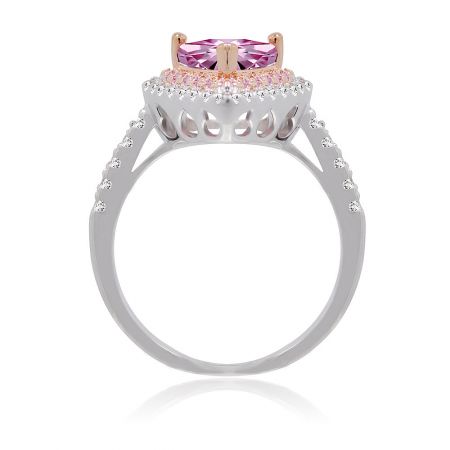 Angled view of the two-tone heart-shaped gemstone ring, highlighting the rose gold accents and detailed stone setting.