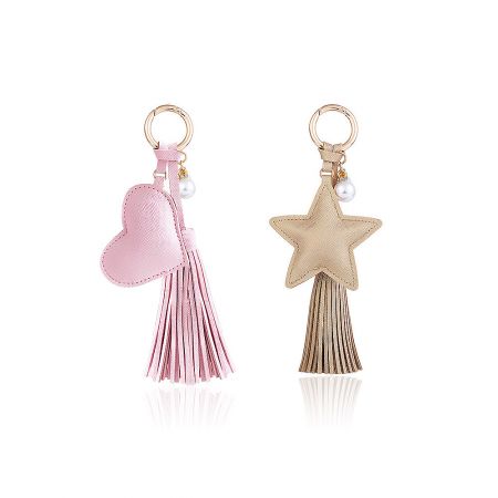 Key Organizer Key Holder Jewelry - Two decorative keychains, one pink heart-shaped and one beige star-shaped, from JR Fashion Accessories' Key Organizer collection.