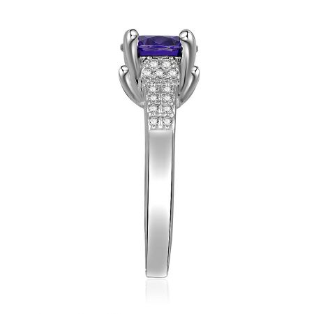 Close-up detail of the purple gemstone silver ring, showing the row of sparkling cubic zirconia beneath the main stone.